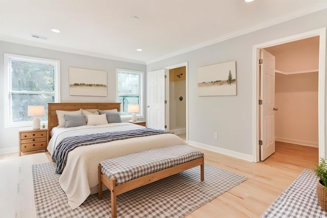Bedroom with light hardwood / wood-style flooring and ornamental molding | Image 18