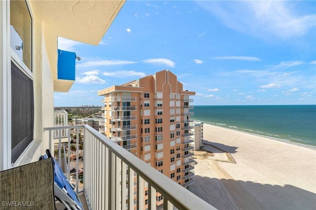 Balcony featuring view of water and beach | Image 27