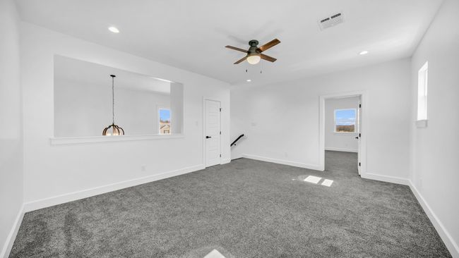 Empty room featuring visible vents, recessed lighting, baseboards, and dark colored carpet | Image 29