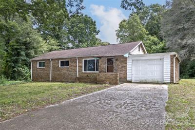 601 E Blue Ridge Road, House other with 3 bedrooms, 2 bathrooms and null parking in East Flat Rock NC | Image 1