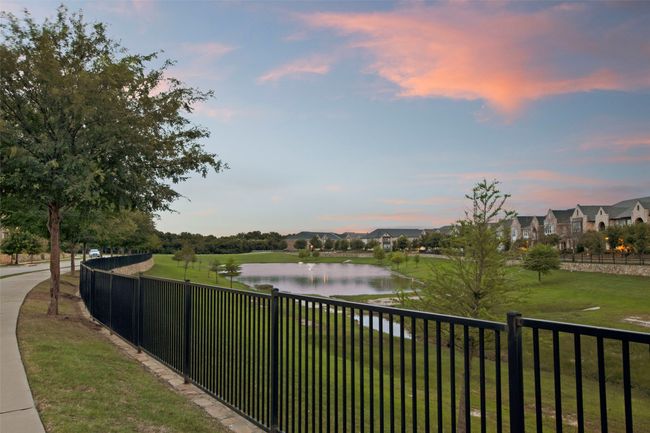 Water view with nearby suburban area | Image 37