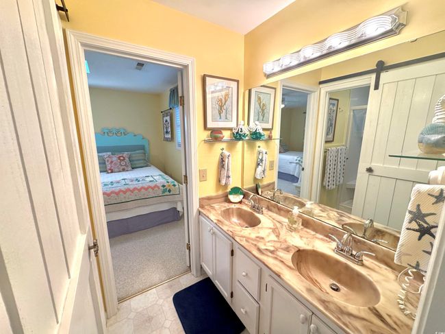 Full bath featuring connected bathroom and double vanity | Image 30