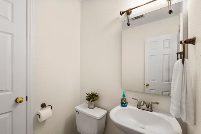 Powder room on the first floor | Image 17