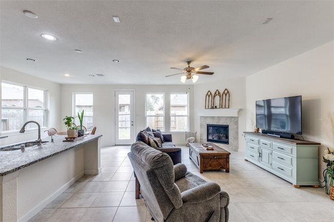 From entry way to living and kitchen at rear of the property. | Image 6
