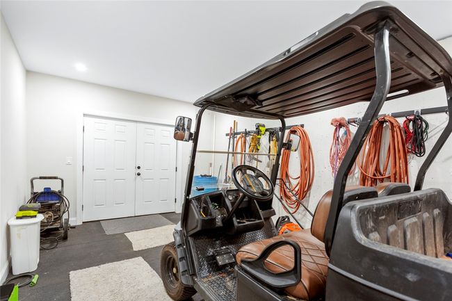 Basement storage with large exterior door | Image 39