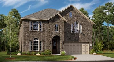 View of front facade featuring a garage and a front lawn | Image 1