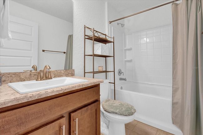 9750 Pepper Tree Pl, House other with 4 bedrooms, 2 bathrooms and null parking in WILDWOOD FL | Image 28
