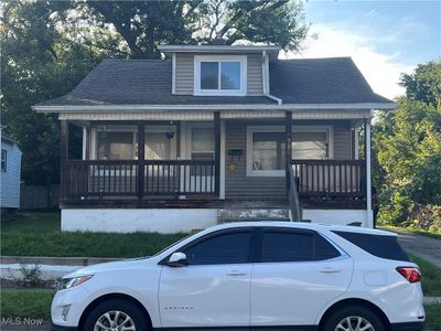 Bungalow featuring a porch | Image 3