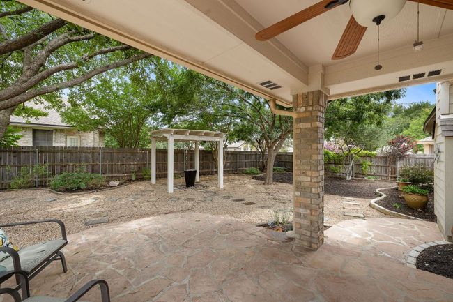 Under patio looking out towards the disappearing fountain | Image 30
