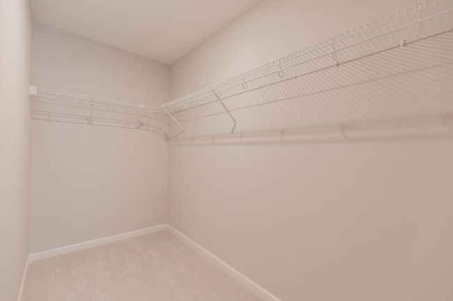 Primary Bedroom Walk-In Closet. *Photo of similar home | Image 13