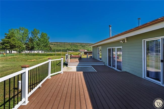 Back deck with access to dining, living rooms | Image 32