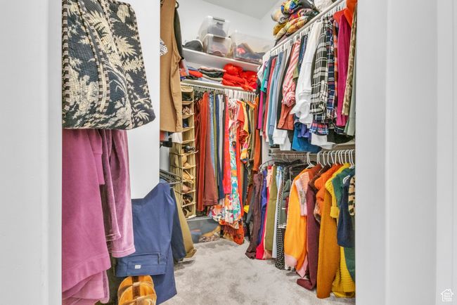 Spacious closet with carpet floors | Image 23