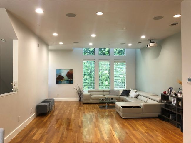 Living room with recessed lighting and wood finished floors | Image 4