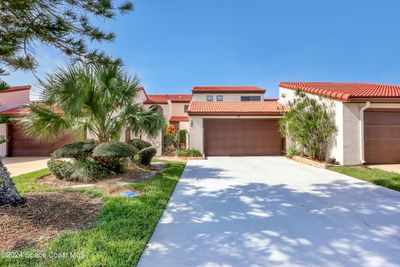 104 Osprey Court, Townhouse with 2 bedrooms, 3 bathrooms and null parking in Melbourne FL | Image 1