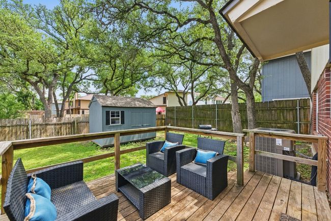 A spacious rear deck provides the perfect setting for outdoor entertaining and relaxation. | Image 28