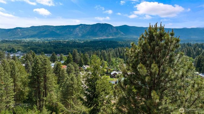 As the newest PNW master-planned community, enjoy 200+ acres of open space, trails & the Coal Trax Mt Bike Park. Soaring ceilings in the great roommake each day worthy of celebration & open floorplan appeals to entertaining. Covered deck & patio. Southern-facing homesites range from the mid600s- 900ks. Enjoy a variety of innovative & distinctive new home options with the best all-season recreation just moments away! Built for the future, indulge in a retreat just 90-min to Seattle. Plans and elevations are artist’s renderings only, may not accurately represent the actual condition of a home asconstructed and may also contain options and upgrades which are not included in the sale. Trailside Homes reserves the right to make changes to the floorplan, specifications, dimensions, design and elevations without prior notice. Stated dimensions and square footage are estimated and should not be usedas representations of the home’s actual size. | Image 33