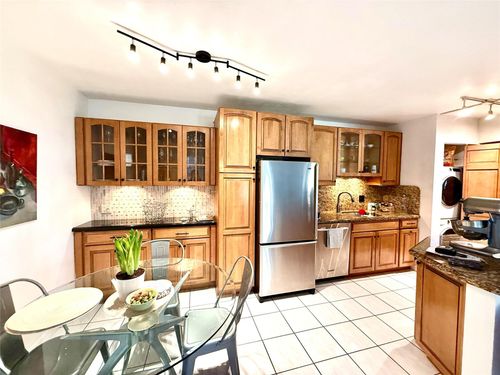 102-677 Trace Cir, Deerfield Beach, FL, 33441-8121 | Card Image