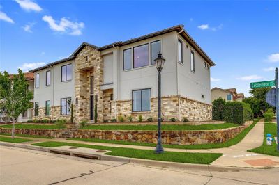 This Mediterranean style home offers a combination of textures and gives you a warm and inviting feeling! It's like bringing a slice of the Mediterranean right to your doorstep. This custom built home is situated on a oversized corner homesite with Golf Course Views from the 2 story Private Balcony. | Image 2