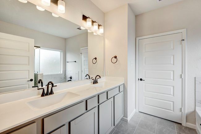 The Davenport II- Primary Bath with Dual Sinks. Home under construction. Sample floor plan photo used for illustrative purposes only. Upgrades, selections options, windows and colors may vary. | Image 10
