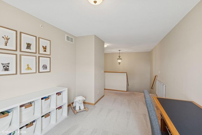 This sunny loft offers a cheerful, light-filled space for work, play, or relaxing | Image 25