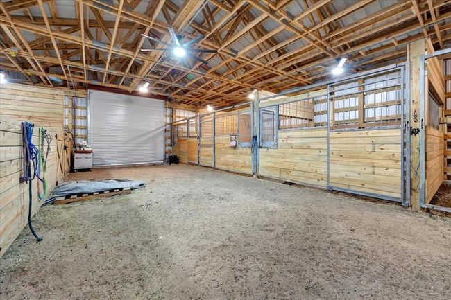 Extra wide for trailers, ceiling fans and lights in every stall. | Image 35