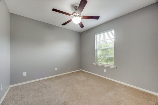 Empty room featuring carpet and ceiling fan | Image 10