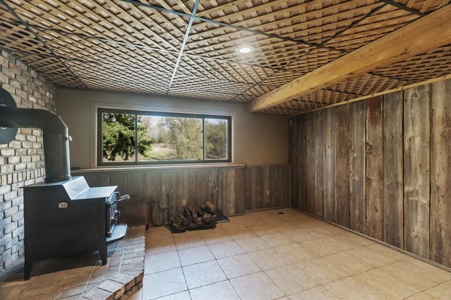 Lower level with wood stove | Image 23