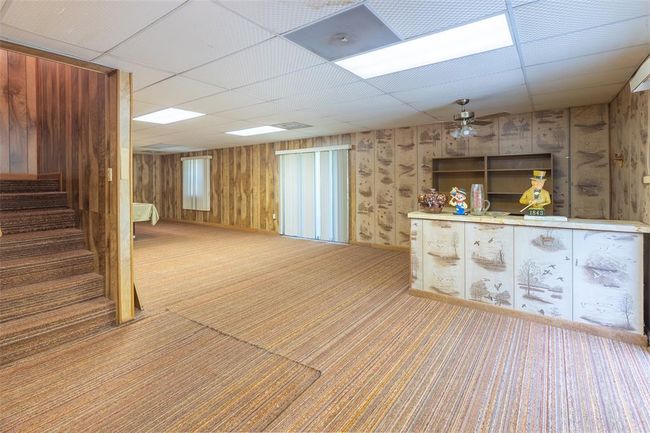 Unfurnished bedroom featuring carpet, a closet, crown molding, and baseboards | Image 15