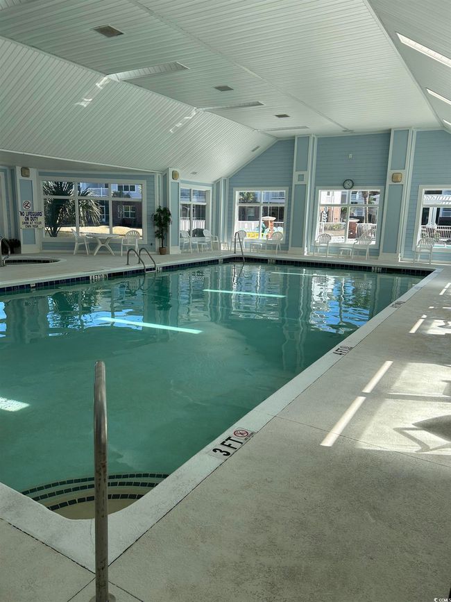 View of indoor pool | Image 25