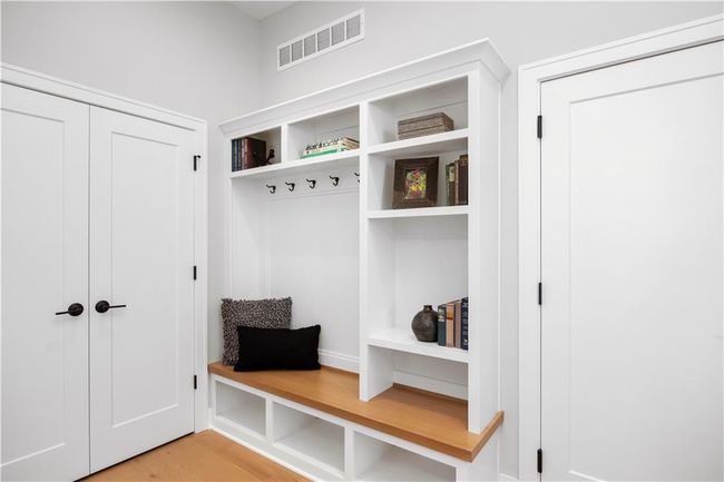 Mud Room off Garage with Boot Bench - Photo is from a finished model | Image 15