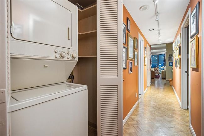 The utility room is conveniently located near the bedrooms for easy access. | Image 24