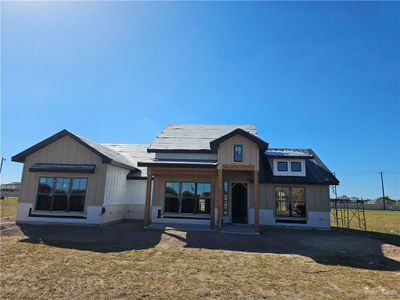 Modern farmhouse featuring a front yard | Image 1