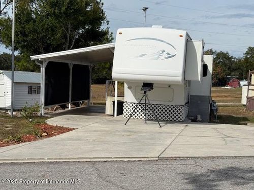 9325 Grizzly Bear Ln, WEEKI WACHEE, FL, 34613-3925 | Card Image