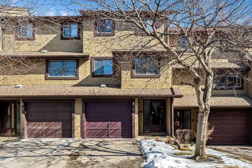 6 Glamis Gardens Sw, Home with 3 bedrooms, 2 bathrooms and 2 parking in Calgary AB | Card Image