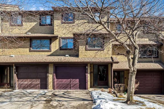 6 Glamis Gardens Sw, Home with 3 bedrooms, 2 bathrooms and 2 parking in Calgary AB | Image 1