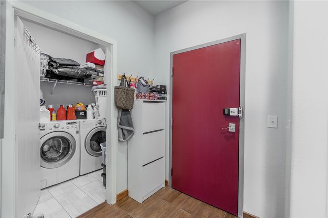 Laundry area with washing machine and dryer | Image 16