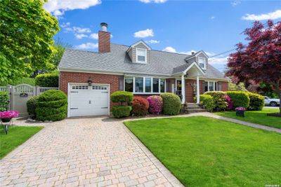 Large brick driveway w garage | Image 1