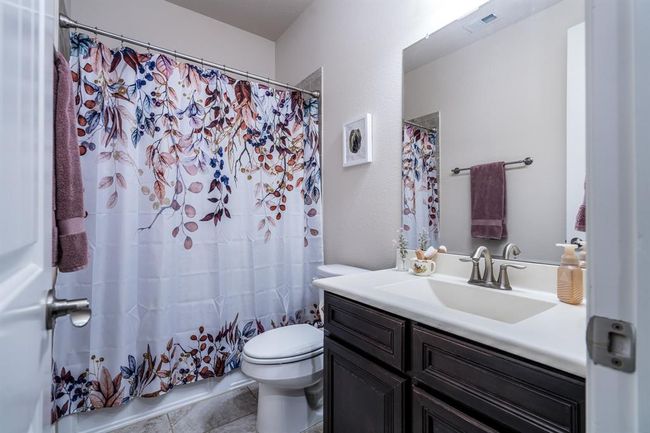Another full bath with tub/shower combo. | Image 13
