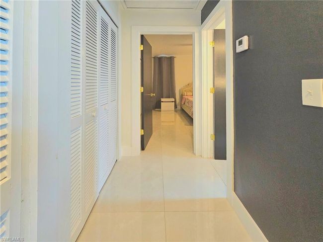Corridor with light tile patterned floors | Image 20