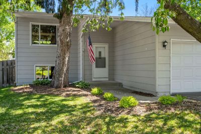 Nicely updated 3 Bedroom/ 2 bath home! New carpet, freshly painted throughout! This home offers lots of daylight w/ views of Spring Lake! | Image 1