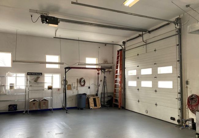 Garage featuring a garage door opener | Image 12