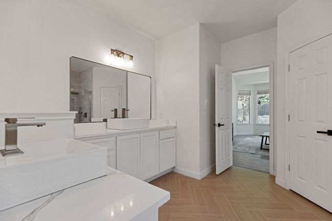Full bathroom with vanity and a stall shower | Image 17