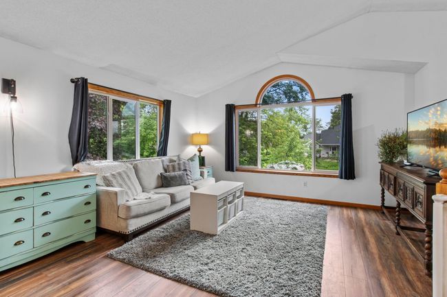 Another view of the light and bright living room. | Image 6