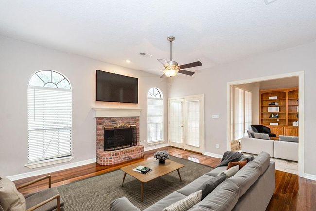 2nd living room-virtual staged looking into main living room. | Image 14