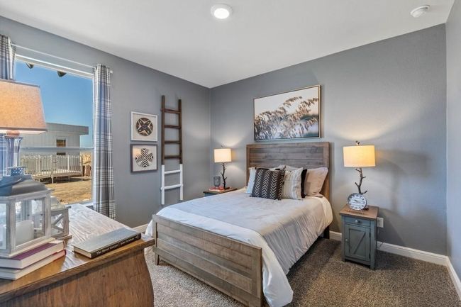 Bedroom featuring baseboards and carpet floors | Image 24