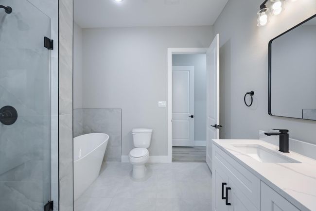Double vanities in both bathrooms offer functionality and comfort | Image 25