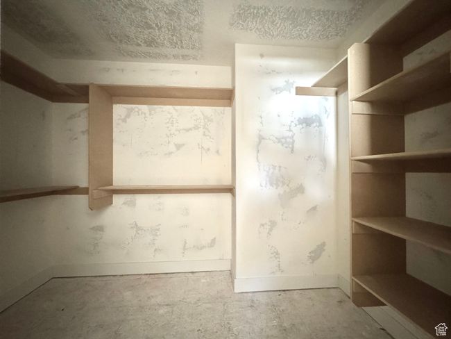 View of walk in closet | Image 12