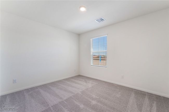 Empty room with light carpet and baseboards | Image 24