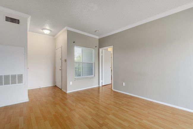Looking towards front door and window onto entrance porch. | Image 4