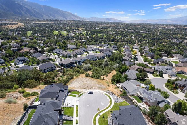 Aerial perspective of suburban area with a mountain backdrop | Image 38